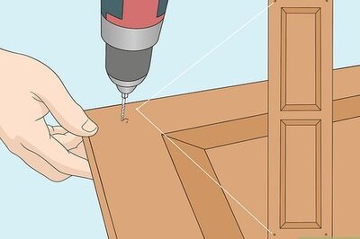How to Hang Wood Shutters on Brick