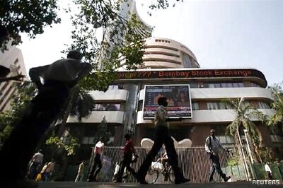 Sensex at nearly 2-month low; slumps 298 points on weak rupee