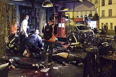 World reacts in shock, solidarity after over 100 killed in Paris terror attacks