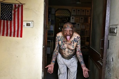 Man Removes Teeth, Gets Over 500 Tattoos To Set World Record