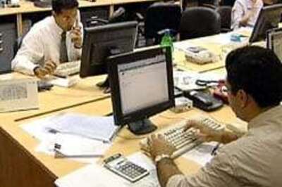 Mkts end flat: banks, cap goods down