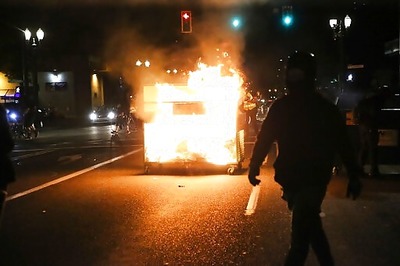 Portland Protesters Set Fire To Building, Police Arrest 25