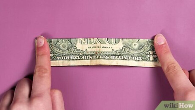 2 Easy Ways to Fold an Origami Cross with a Dollar Bill