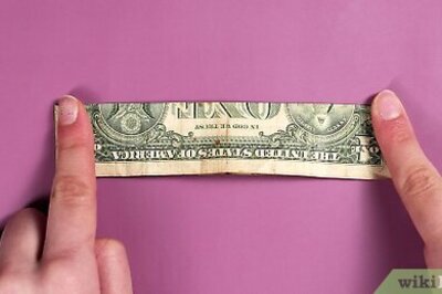 2 Easy Ways to Fold an Origami Cross with a Dollar Bill