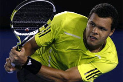 Tsonga downs Djokovic to set up semi-final with Federer