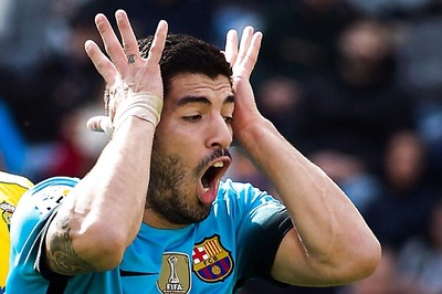 Arsenal must keep Luis Suarez quiet, says wary Arsene Wenger
