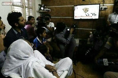Away from Rashtrapati Bhavan, Modi's mother watches him taking oath as PM on TV