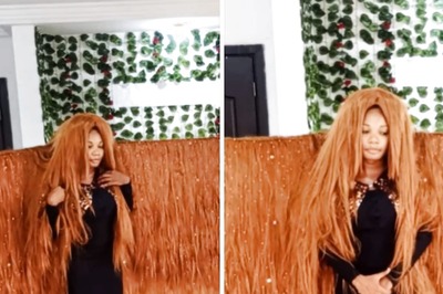 Watch: Nigerian Woman Breaks World Record For The Widest Wig