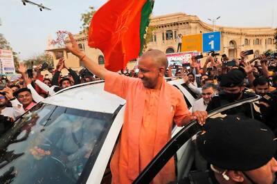 News18 Afternoon Digest: The Carefully Planned Guest List for Yogi's Oath-taking, Can Putin Ever Be Arrested for Ukraine War & Other Top Stories