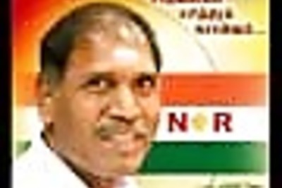 Puducherry CM N Rangasamy proceeds on bike to booth to cast vote