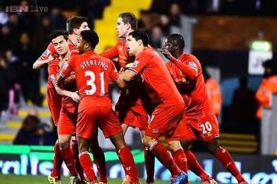 Loss-making Liverpool chase Champions League boost
