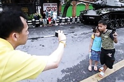Bangkok cool as army seizes PM house