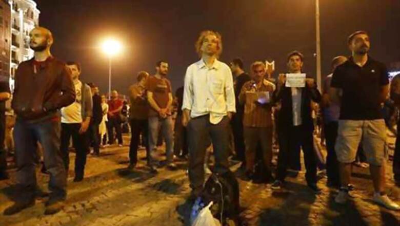 Dozens arrested in Turkey, silent protester goes viral