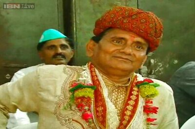 Snapshot: Candidates grab attention by their colourful attire at electoral office in Allahabad