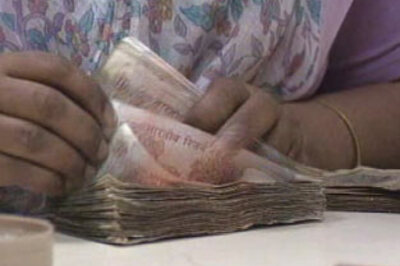 Rupee hits record low, dealers relying on RBI