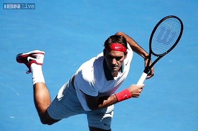 Federer plays it cool in first round win at Australian Open