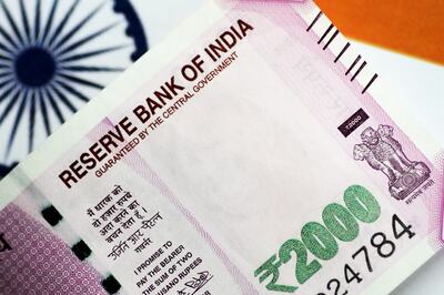 Rupee Hits Record Low of 77.73 Against Dollar, Market Watches for Cenbank to Intervene