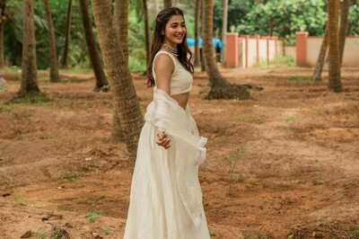 Pooja Hegde Dazzles In A Minimalist Ivory Chanderi Lehenga